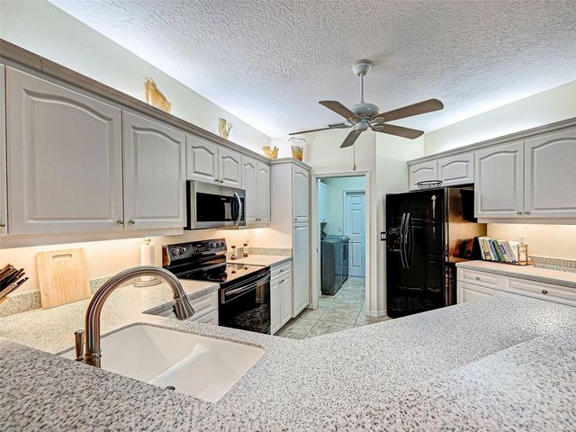 1989 WHITE FEATHER LANE, Nokomis, FL 34275