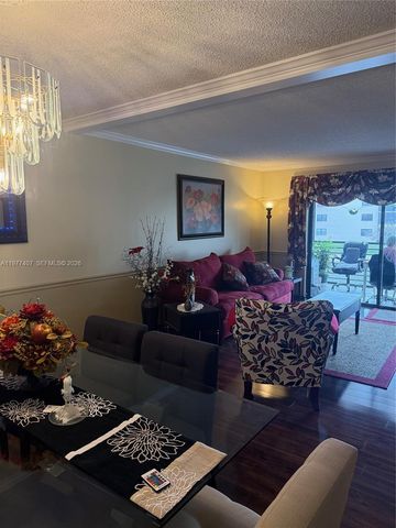 4940 E Sabal Palm Boulevard 203, Tamarac, FL 33319