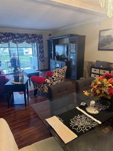 4940 E Sabal Palm Boulevard 203, Tamarac, FL 33319