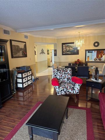 4940 E Sabal Palm Boulevard 203, Tamarac, FL 33319