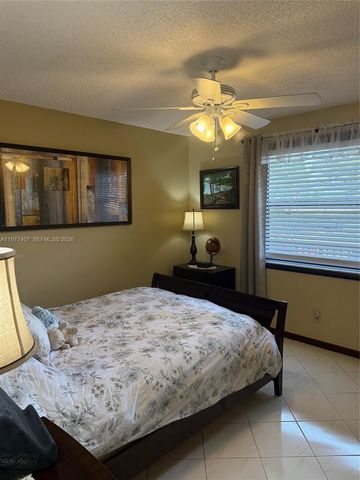 4940 E Sabal Palm Boulevard 203, Tamarac, FL 33319