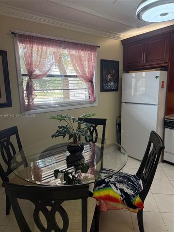 4940 E Sabal Palm Boulevard 203, Tamarac, FL 33319