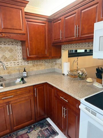 4940 E Sabal Palm Boulevard 203, Tamarac, FL 33319