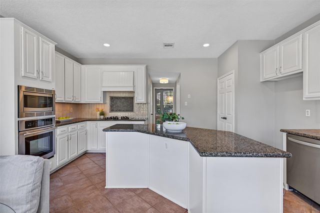 303 Melodywood Drive, Friendswood, TX 77546