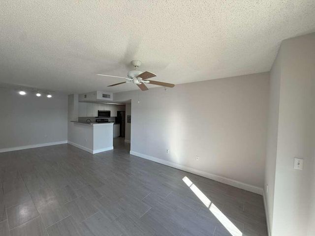 5035 Wiles Road 206, Coconut Creek, FL 33073