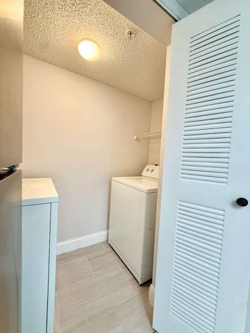 5035 Wiles Road 206, Coconut Creek, FL 33073