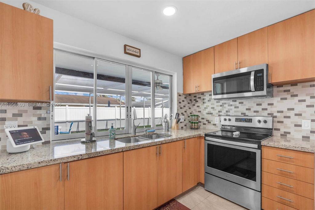 Image 10 of property listing at 10631 NW 28th St, Sunrise, FL 33322