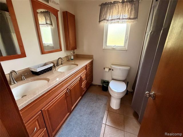 9739 Waterway Drive, Grosse Ile, MI 48138