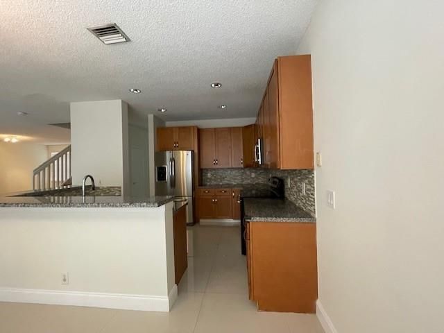 1156 Chinaberry Dr, Weston, FL 33327