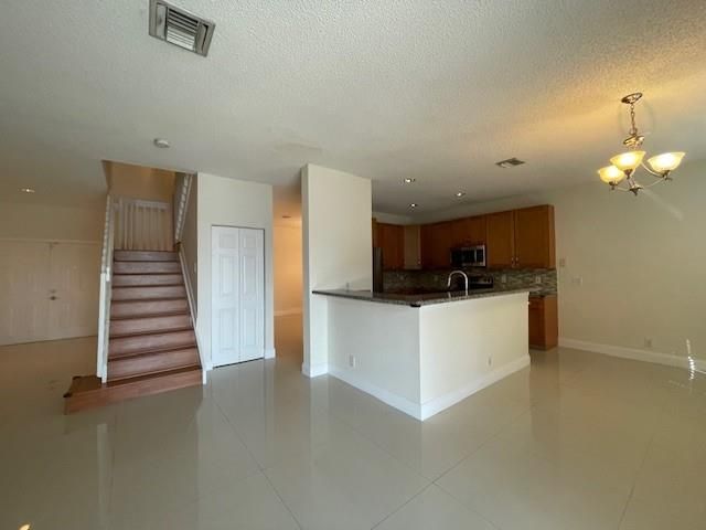 1156 Chinaberry Dr, Weston, FL 33327