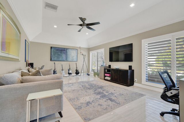 513 N Country Club Drive, Atlantis, FL 33462