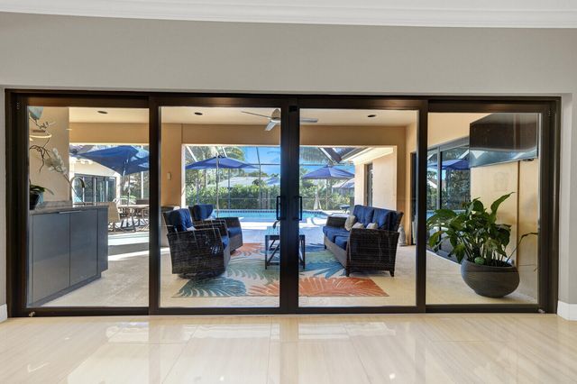 513 N Country Club Drive, Atlantis, FL 33462
