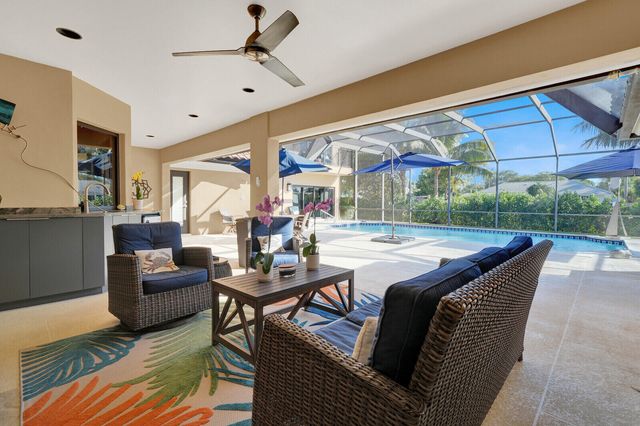 513 N Country Club Drive, Atlantis, FL 33462