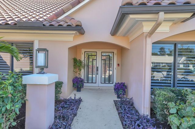 513 N Country Club Drive, Atlantis, FL 33462