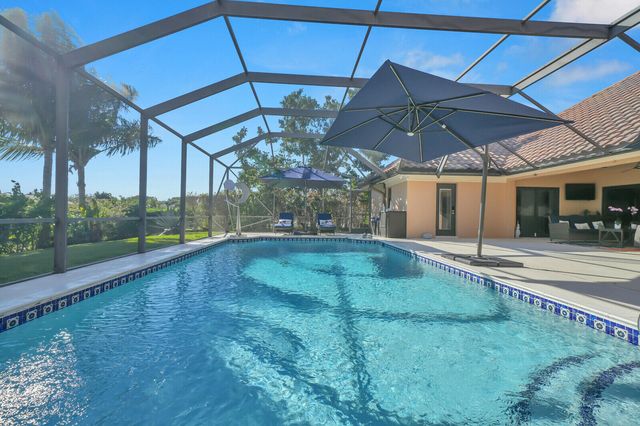 513 N Country Club Drive, Atlantis, FL 33462
