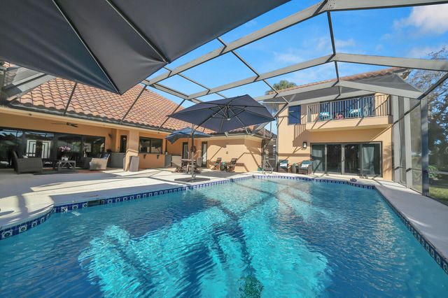 513 N Country Club Drive, Atlantis, FL 33462
