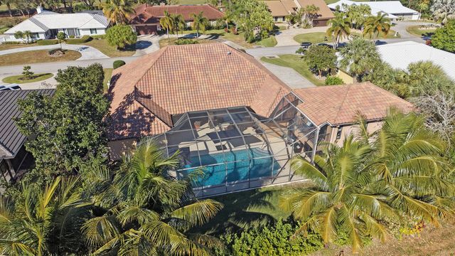 513 N Country Club Drive, Atlantis, FL 33462