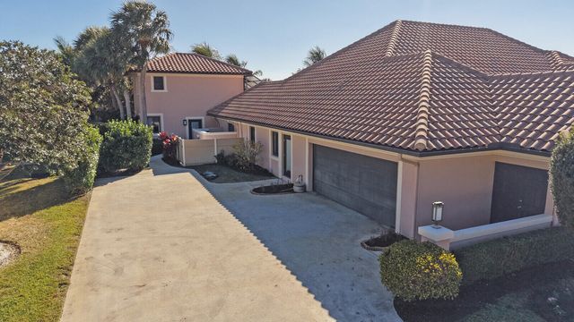 513 N Country Club Drive, Atlantis, FL 33462