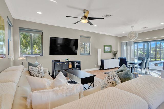 513 N Country Club Drive, Atlantis, FL 33462