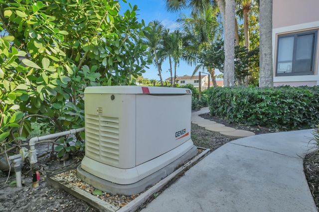 513 N Country Club Drive, Atlantis, FL 33462