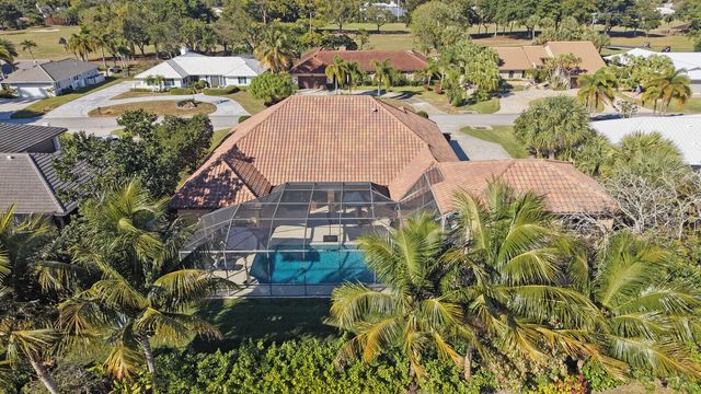 513 N Country Club Drive, Atlantis, FL 33462