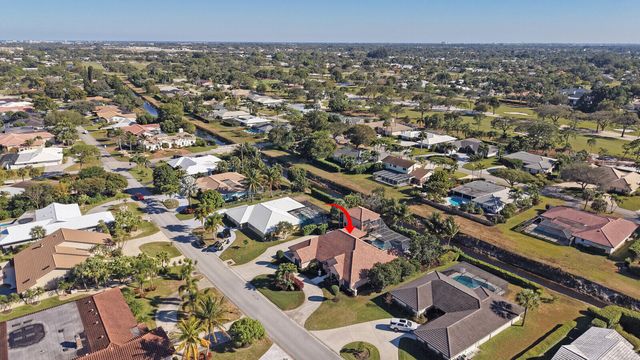 513 N Country Club Drive, Atlantis, FL 33462
