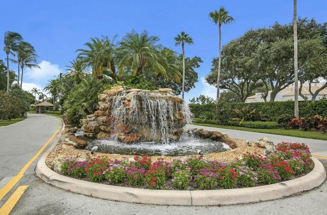 513 N Country Club Drive, Atlantis, FL 33462
