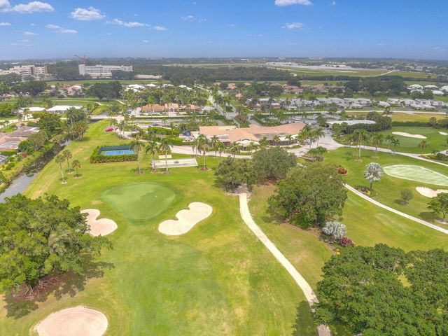 513 N Country Club Drive, Atlantis, FL 33462