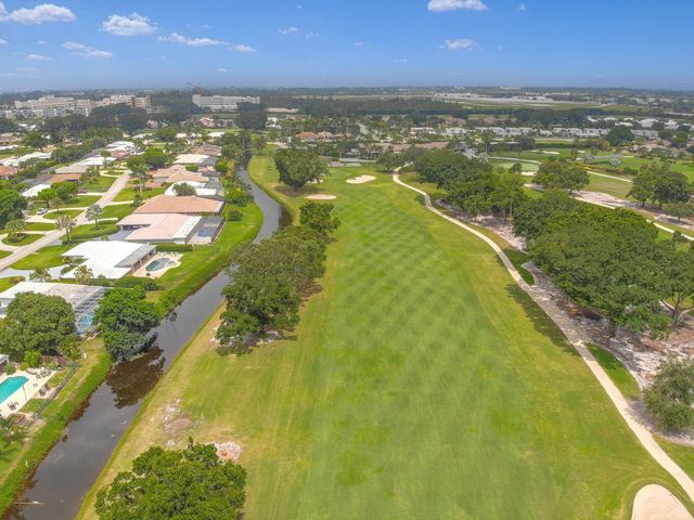 513 N Country Club Drive, Atlantis, FL 33462