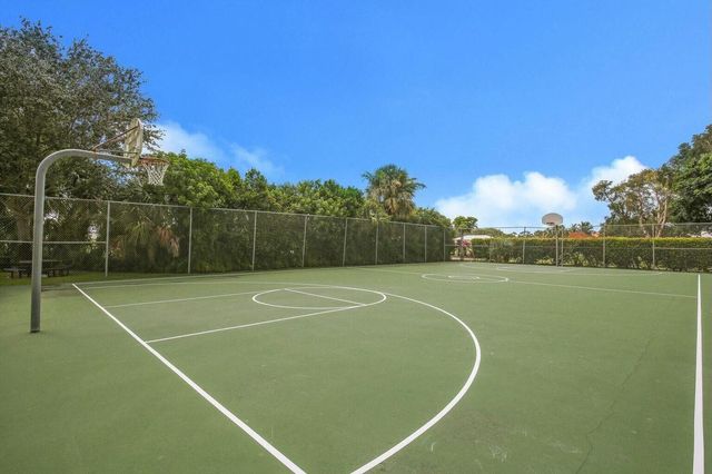 513 N Country Club Drive, Atlantis, FL 33462