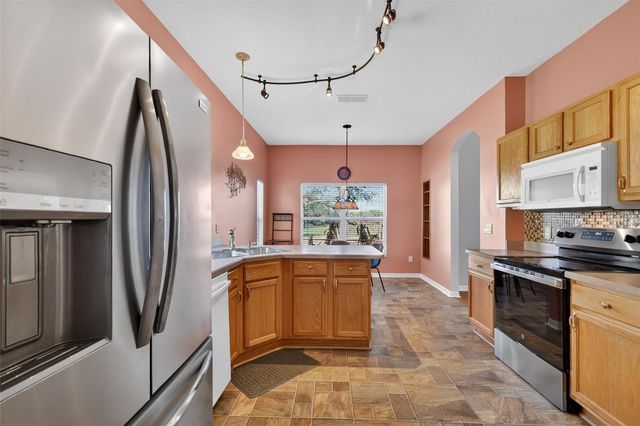 5024 LONG MEADOW DRIVE, Leesburg, FL 34748