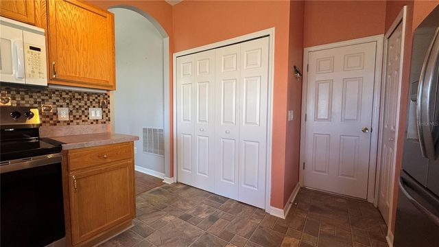 5024 LONG MEADOW DRIVE, Leesburg, FL 34748