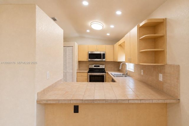 9733 NW 126th Terrace, Hialeah Gardens, FL 33018