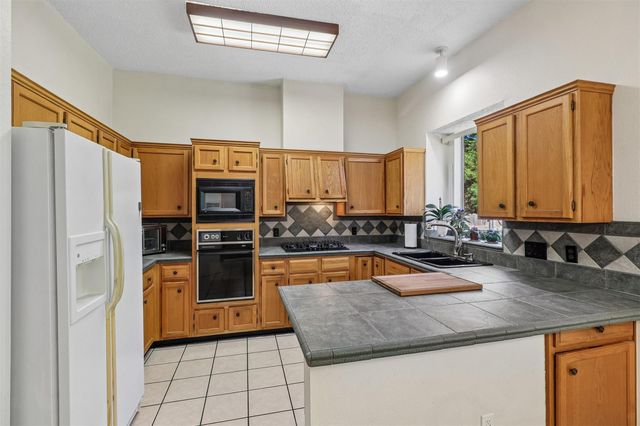 12513 Hunters Chase DR, Austin, TX 78729