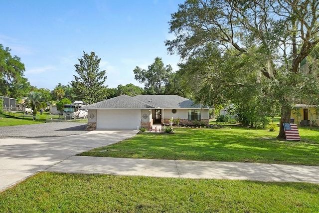 235 W RETTA STREET, De Leon Springs, FL 32130