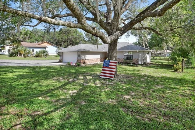 235 W RETTA STREET, De Leon Springs, FL 32130