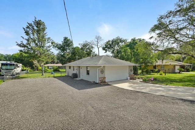 235 W RETTA STREET, De Leon Springs, FL 32130