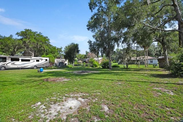 235 W RETTA STREET, De Leon Springs, FL 32130