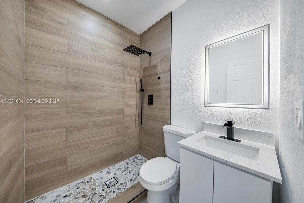 Image 11 of property listing at 6911 NW 4th Ct, Miami, FL 33150