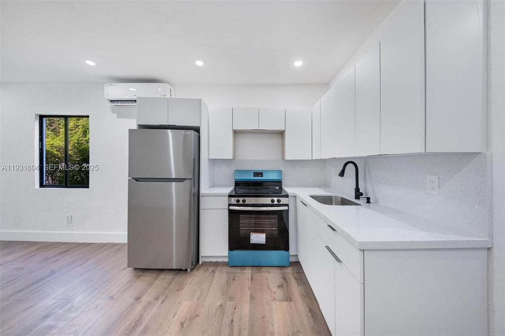 Image 21 of property listing at 6911 NW 4th Ct, Miami, FL 33150