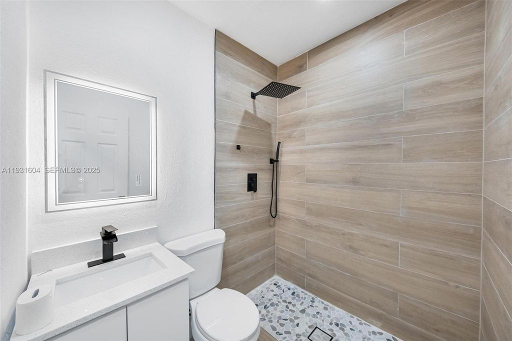 Image 22 of property listing at 6911 NW 4th Ct, Miami, FL 33150