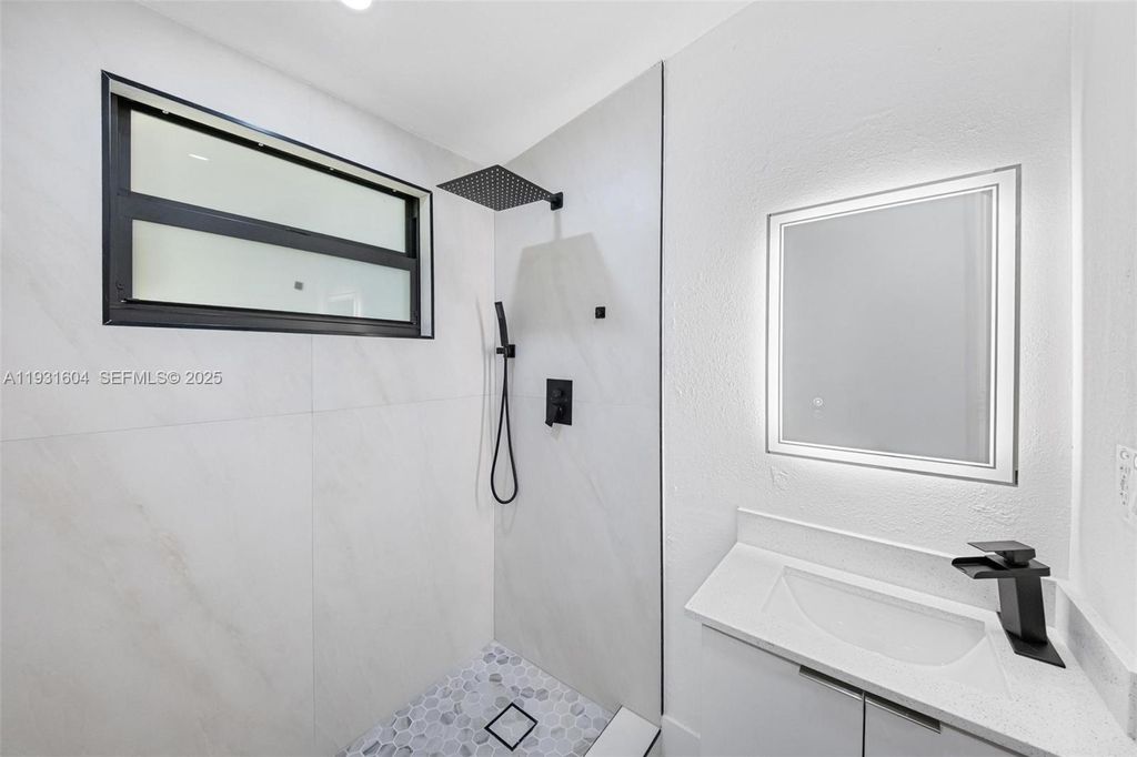 Image 32 of property listing at 6911 NW 4th Ct, Miami, FL 33150