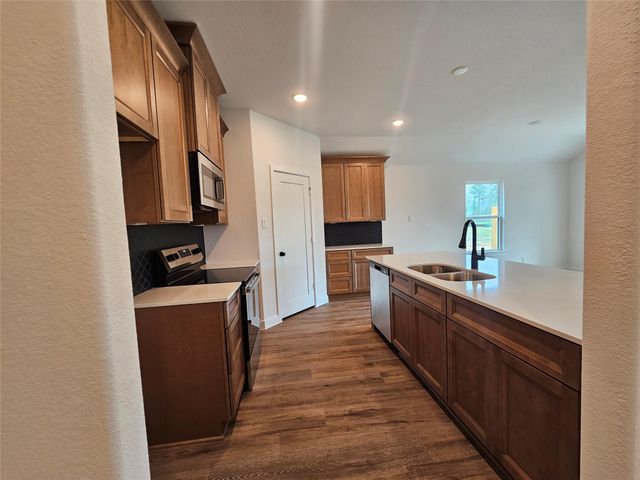 12007 Curlin Drive, Willis, TX 77318