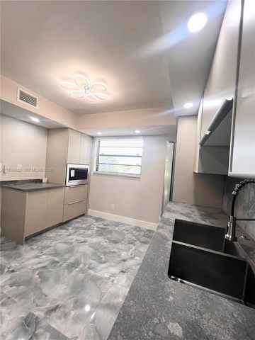 4930 E Sabal Palm Boulevard 206, Tamarac, FL 33319