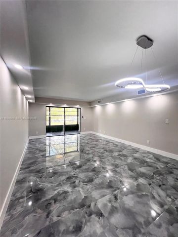 4930 E Sabal Palm Boulevard 206, Tamarac, FL 33319