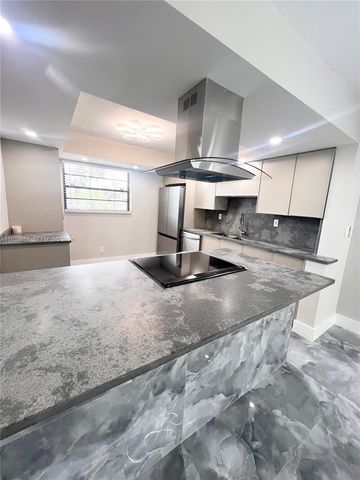 4930 E Sabal Palm Boulevard 206, Tamarac, FL 33319