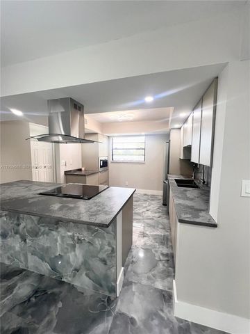 4930 E Sabal Palm Boulevard 206, Tamarac, FL 33319