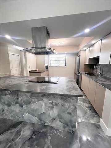 4930 E Sabal Palm Boulevard 206, Tamarac, FL 33319