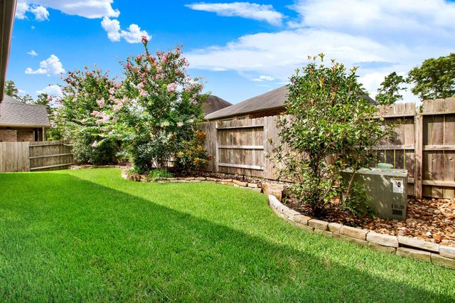 510 Blossom Cove Court, Pinehurst, TX 77362
