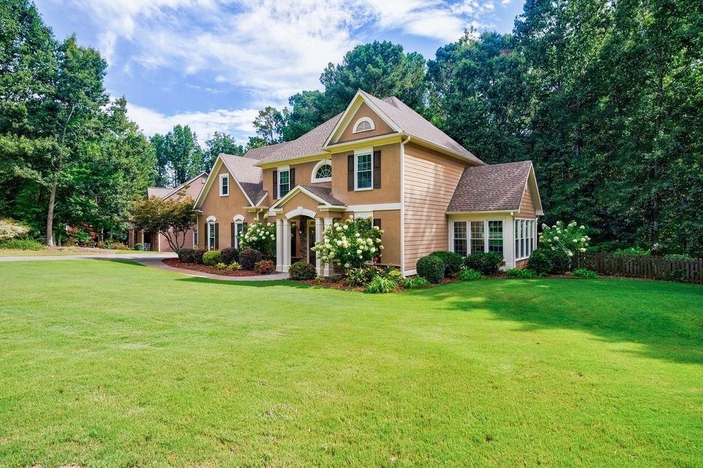 Image 1 of property listing at 6705 Fox Creek Drive, Cumming, GA 30040